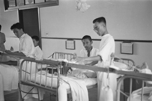 Doctors with patients in a hospital ward, Shanghai