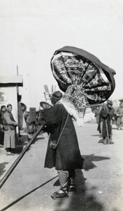 Umbrella holder and drummer