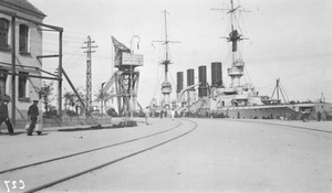 A battleship berthed at Tsintauer wharf, Tsingtao (青岛)