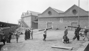 Labourers carrying logs, Nanking