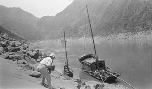 A European photographing a boat, Ichang Gorges
