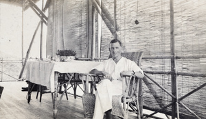 Frederick George Trobridge on the veranda at the Bungalow, China Mining & Metal Company Ltd., Hong Kong