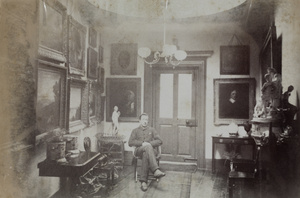 Walter sitting in the hall of a house in Richmond, England