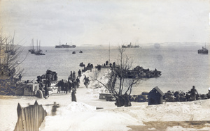 Pier with cargo and shipping, in winter, Weihaiwei