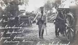 Unloading of Qing army guns from a train at the railway crossing on Race Course Road, Hankou