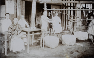 Overseers with workers weighing sewn up bags of salt, Tzuliuching, Zidong